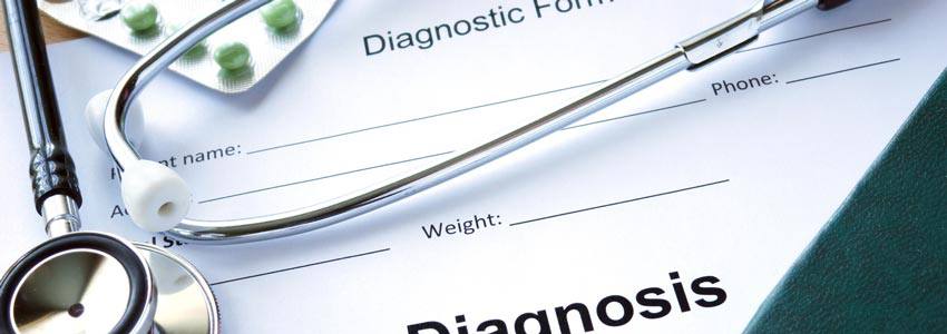 A diagnosis paper with a stethoscope on top of it