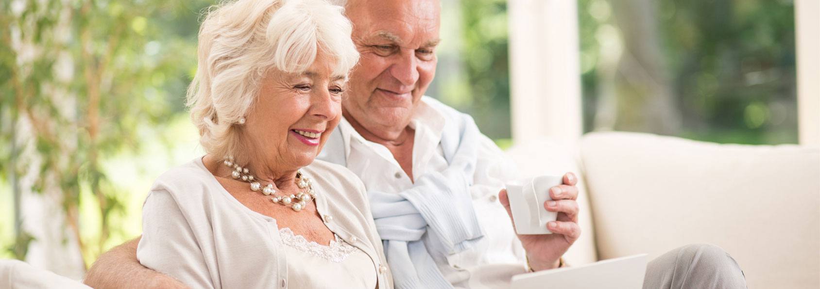 Senior couple on computer