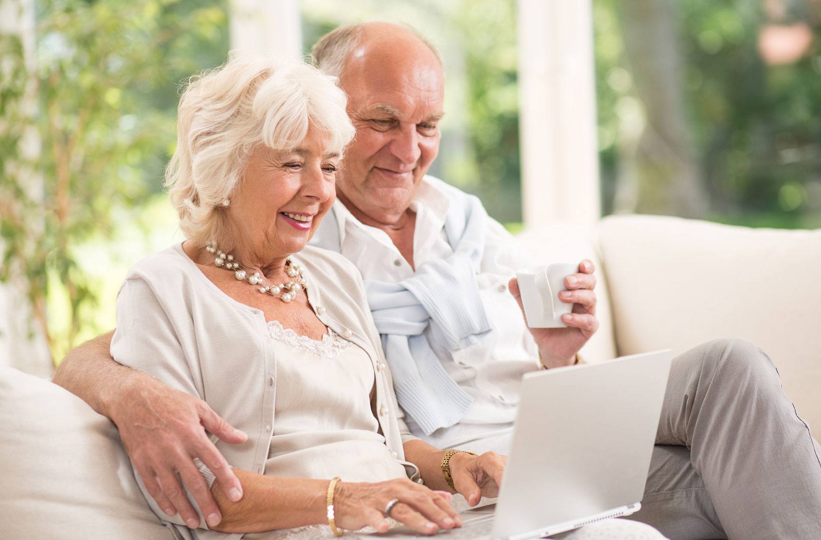 Senior couple on computer