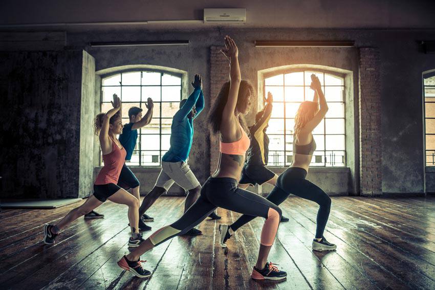 A group of people doing a workout together
