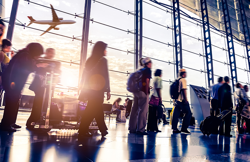 An airport filled with people 